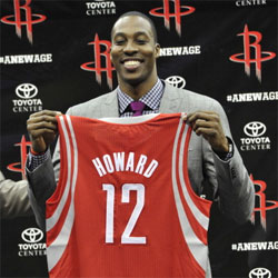 Dwight Howard holds his Rockets jersey