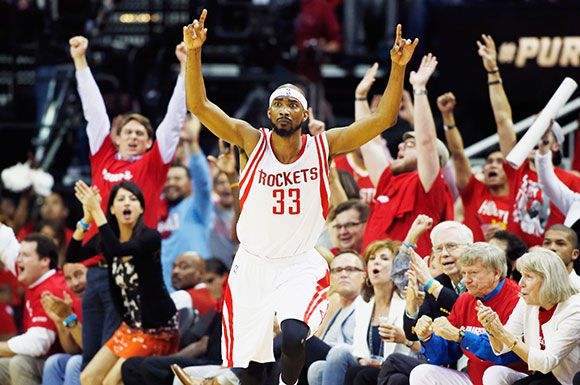 Corey Brewer celebrates